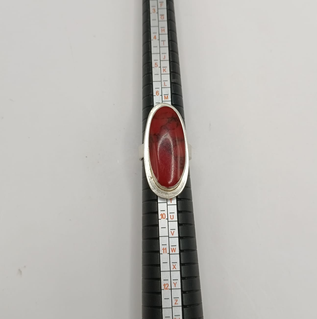 Anillo con sintetico rojo PLATA 925 peso 12.6gr, usado