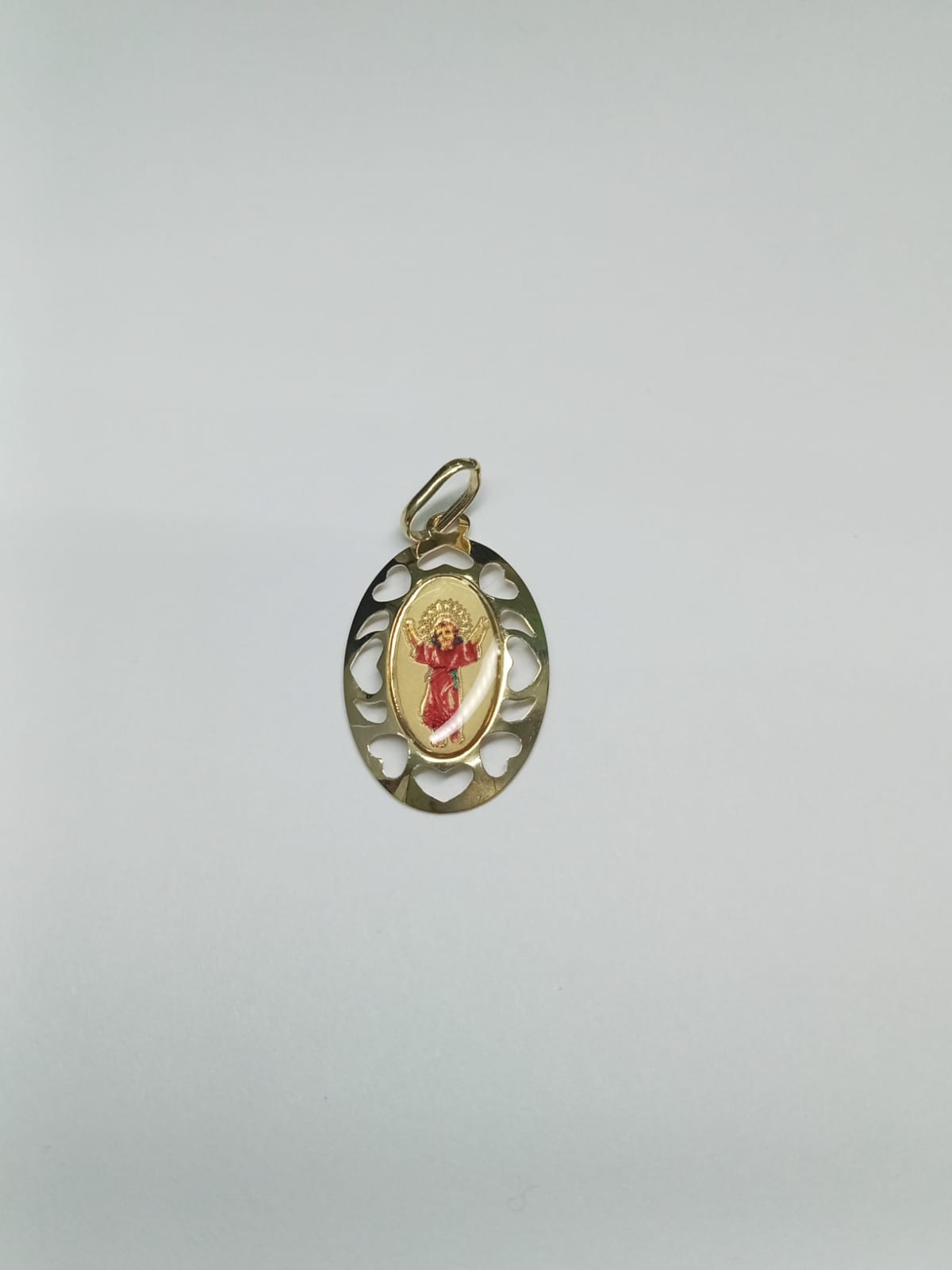 Dije Religioso en Oro 10k con Diseño de Corazón