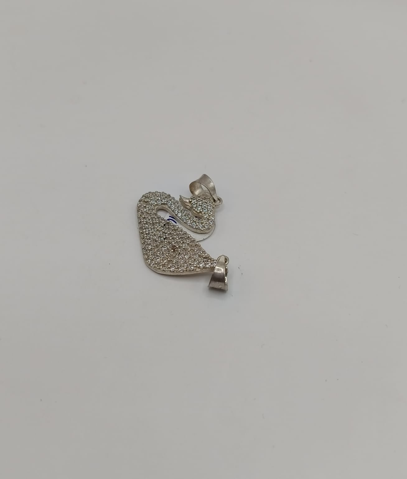 Dije de cisne con sinteticos PLATA 925 peso 3.3gr, usado
