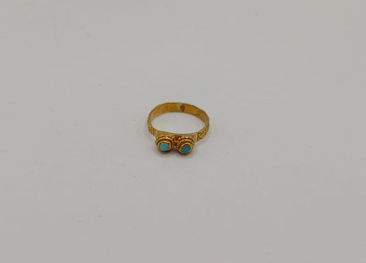 Anillo con dos piedras azules ORO 18k peso 3.7gr, usado