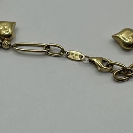 Pulcera de oro de corazones 10k 5.4 grms usada