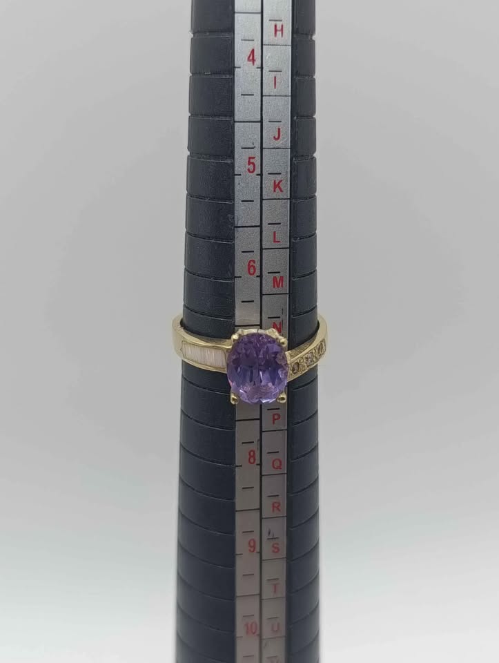 Anillo de oro con piedra morada 10k 2.5 gr #6.5