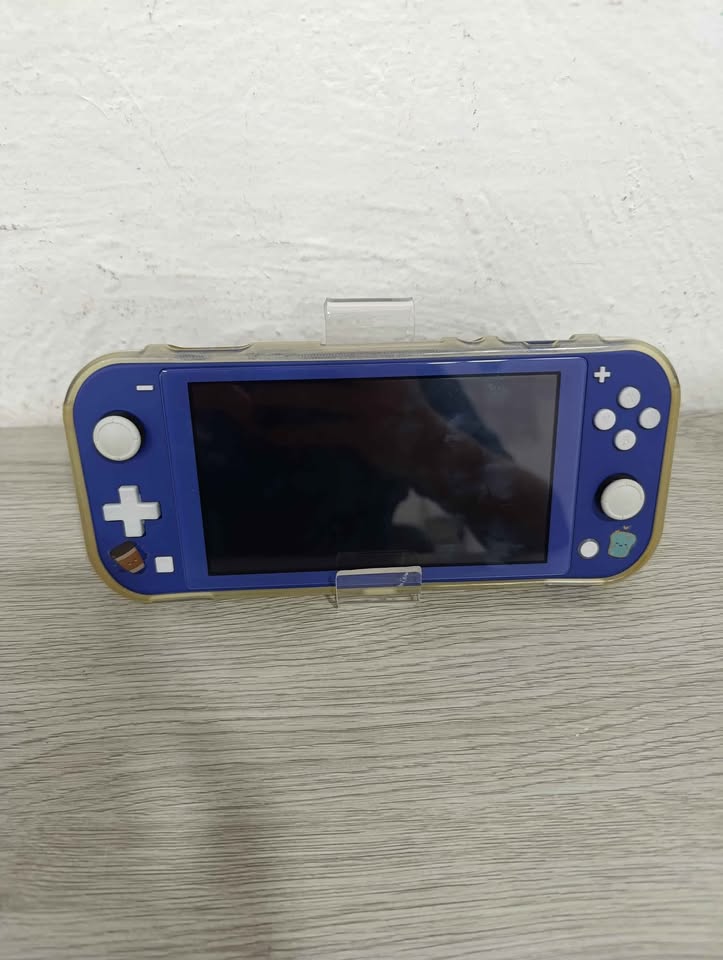 Nintendo Switch Lite con cargador y 1 juego