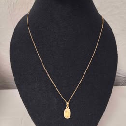 Cadena con dije de virgen 10k p 2.2gr