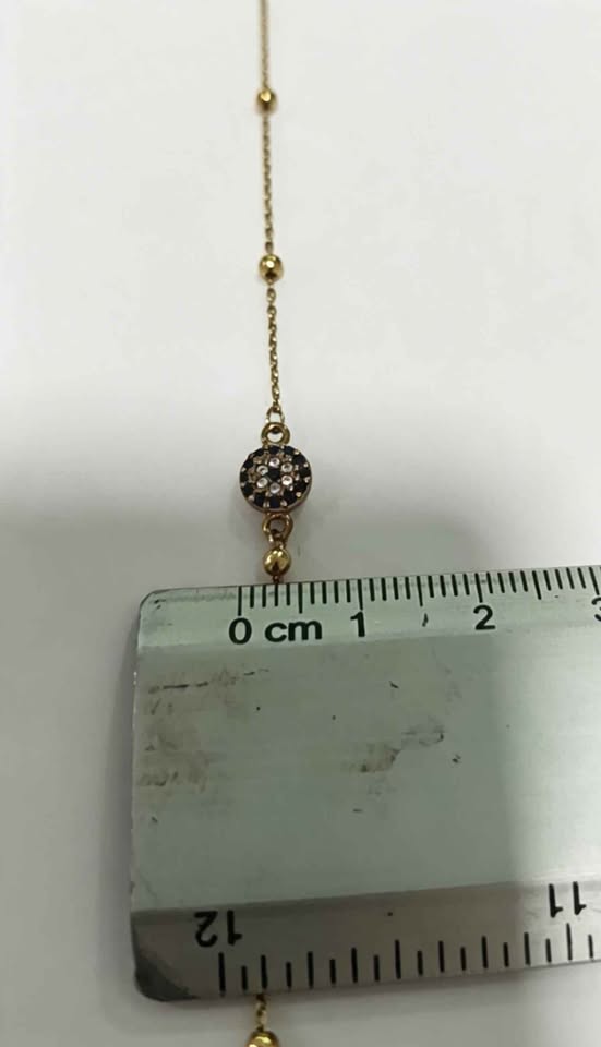 Oro pulcera con cuentas y Dije central azul 10k 1.3g