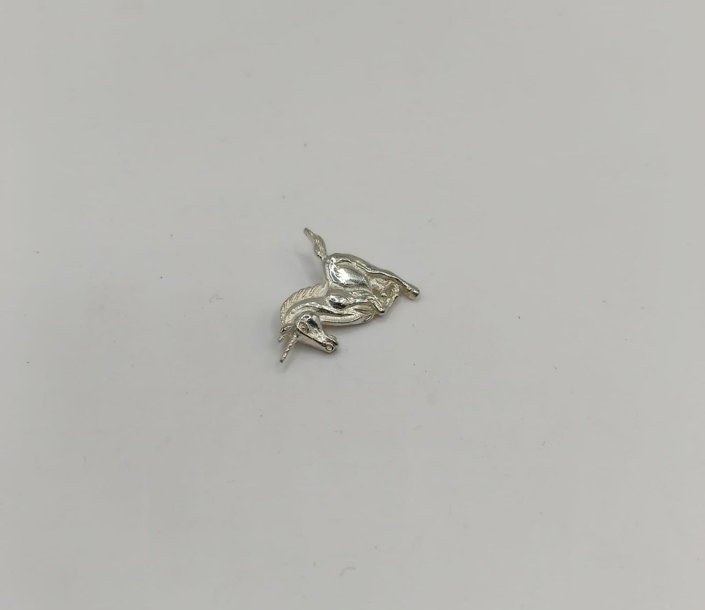 Dije unicornio PLATA 925 peso 1.9gr, usado