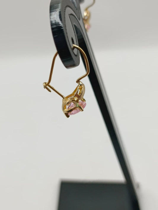 Aretes sintetico rosa ORO 10k peso 1.5gr, usado