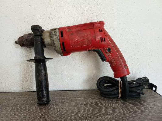 Taladro percutor Milwaukee-usado