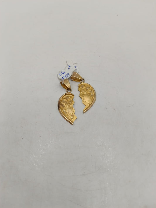Dije de Corazon partido ORO 8k peso 3.2gr, usado