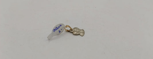 Dije dos caras ORO 10k peso .9gr, usado