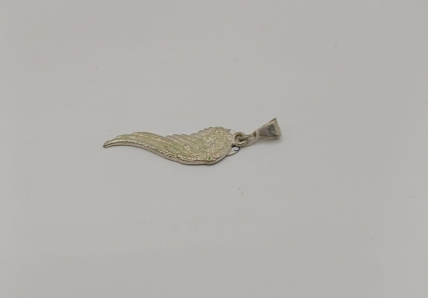 Dije de Ala PLATA 925 peso 3.6gr, usado