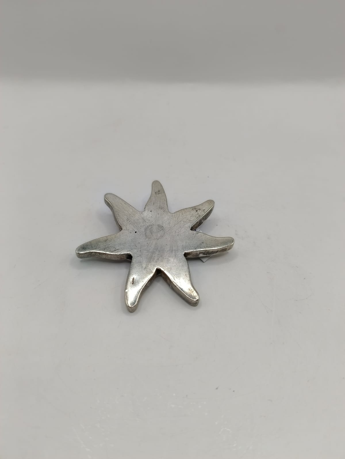 Dije de estrella PLATA  peso 19gr, usado