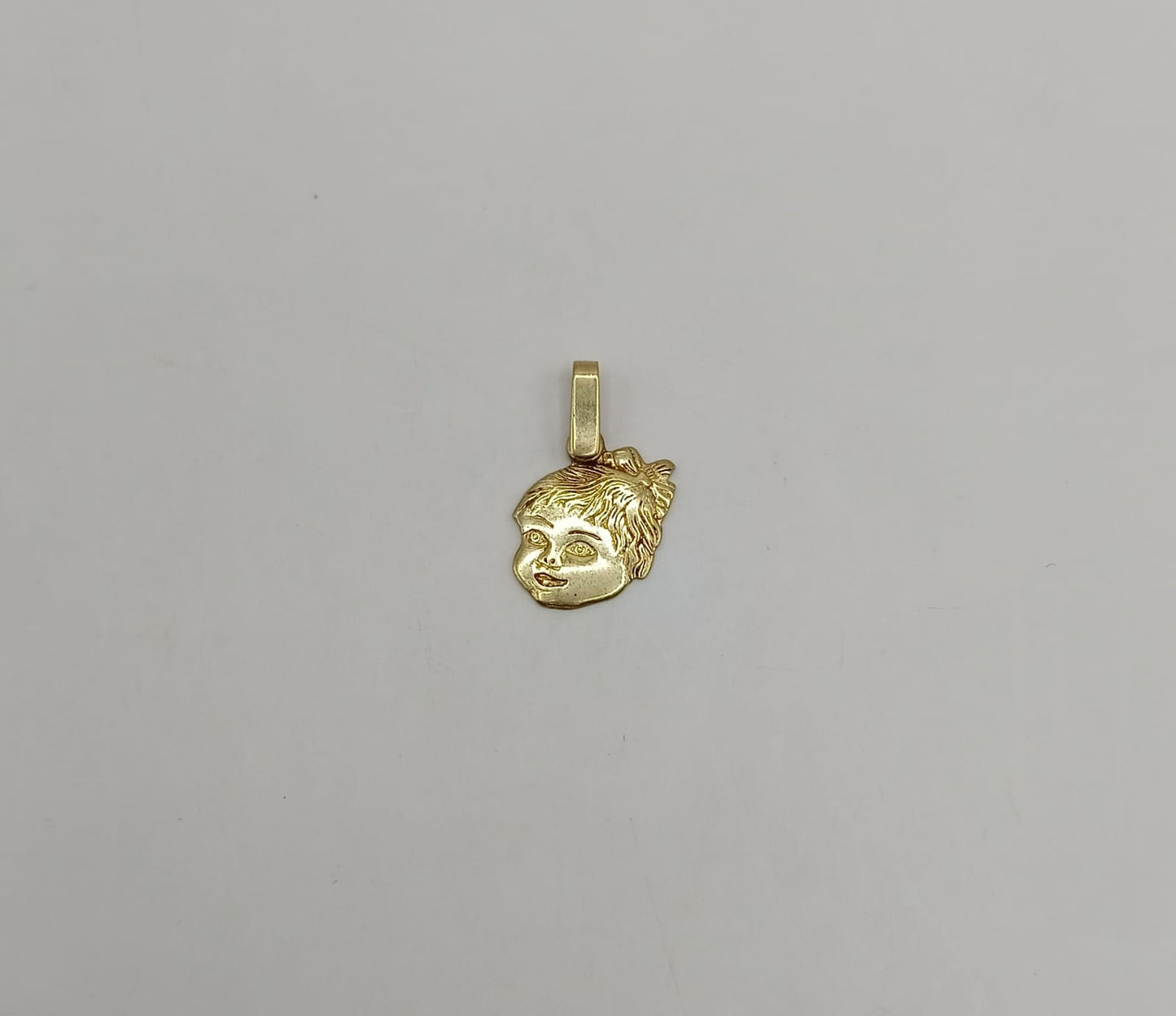 Dije de niña ORO 10k peso 1gr, usado