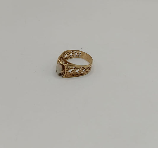 Anillo con sintetico pequeño ORO 10k peso 4.7gr, usado