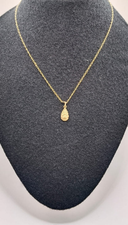 Cadena con dije ORO 14k peso 2.9gr, usado
