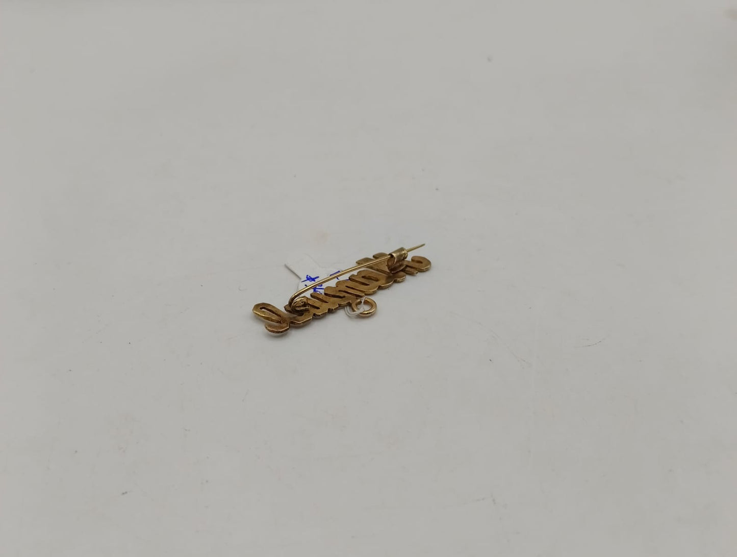 Dije de nombre "MANUEL" ORO 10k peso 1.6gr, usado