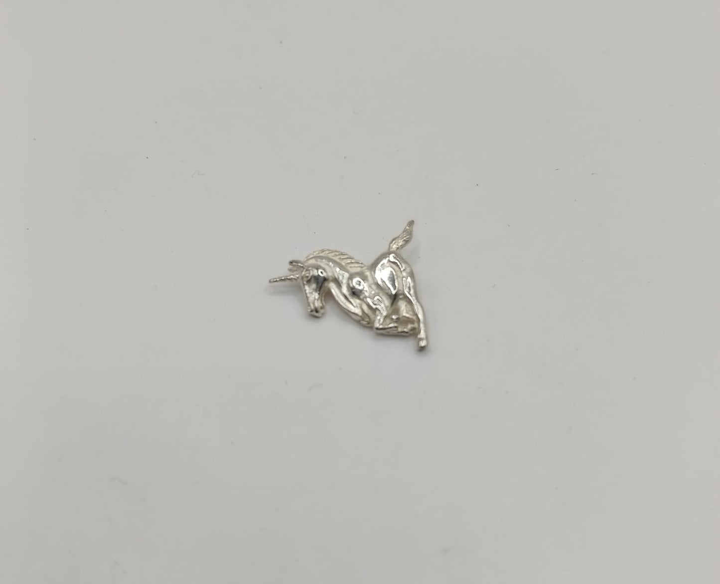 Dije unicornio PLATA 925 peso 1.9gr, usado