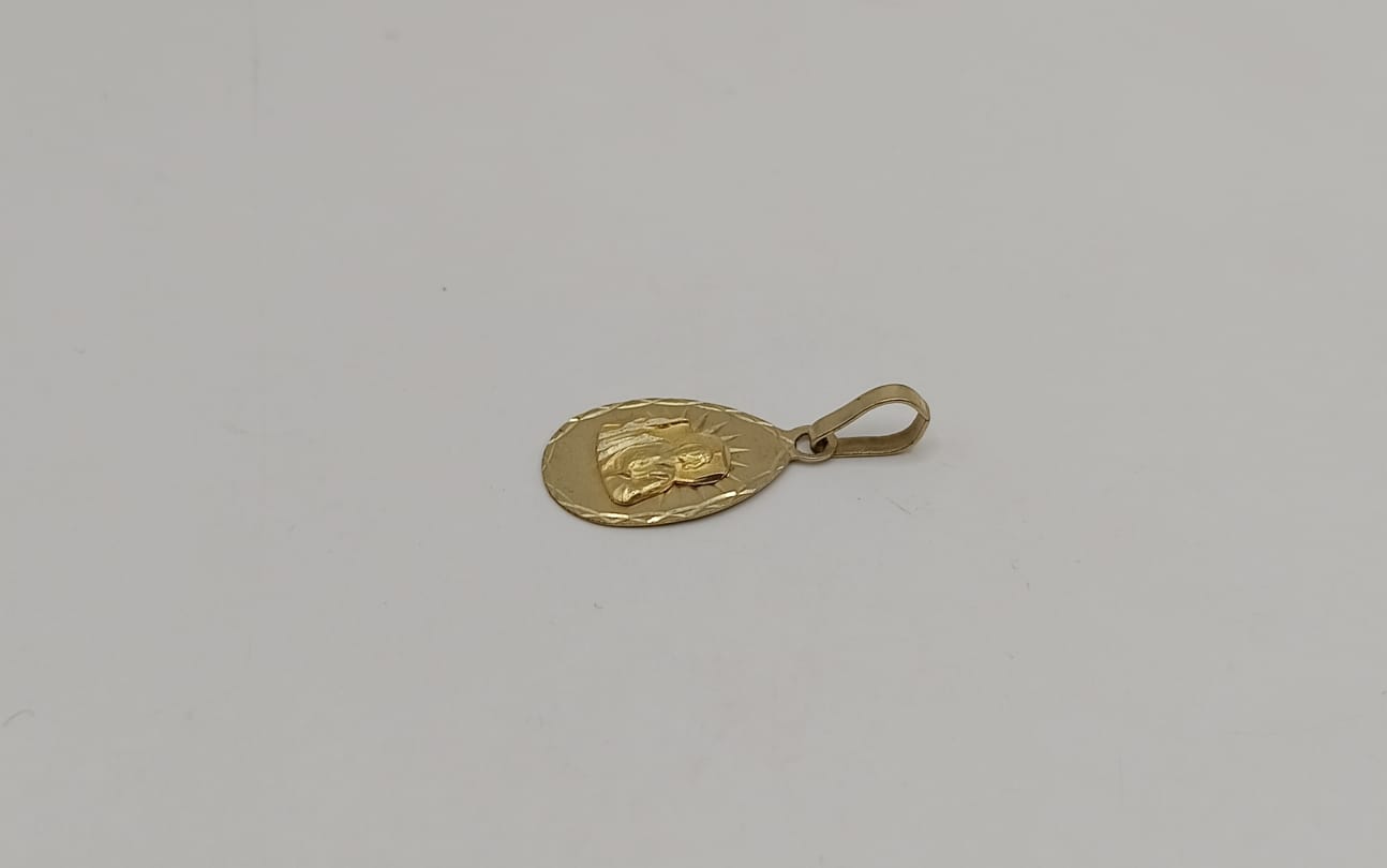 Dije relioso ORO 10k peso 1gr, usado