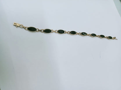 pulsera de oro 10k -diseño sinteticos negros