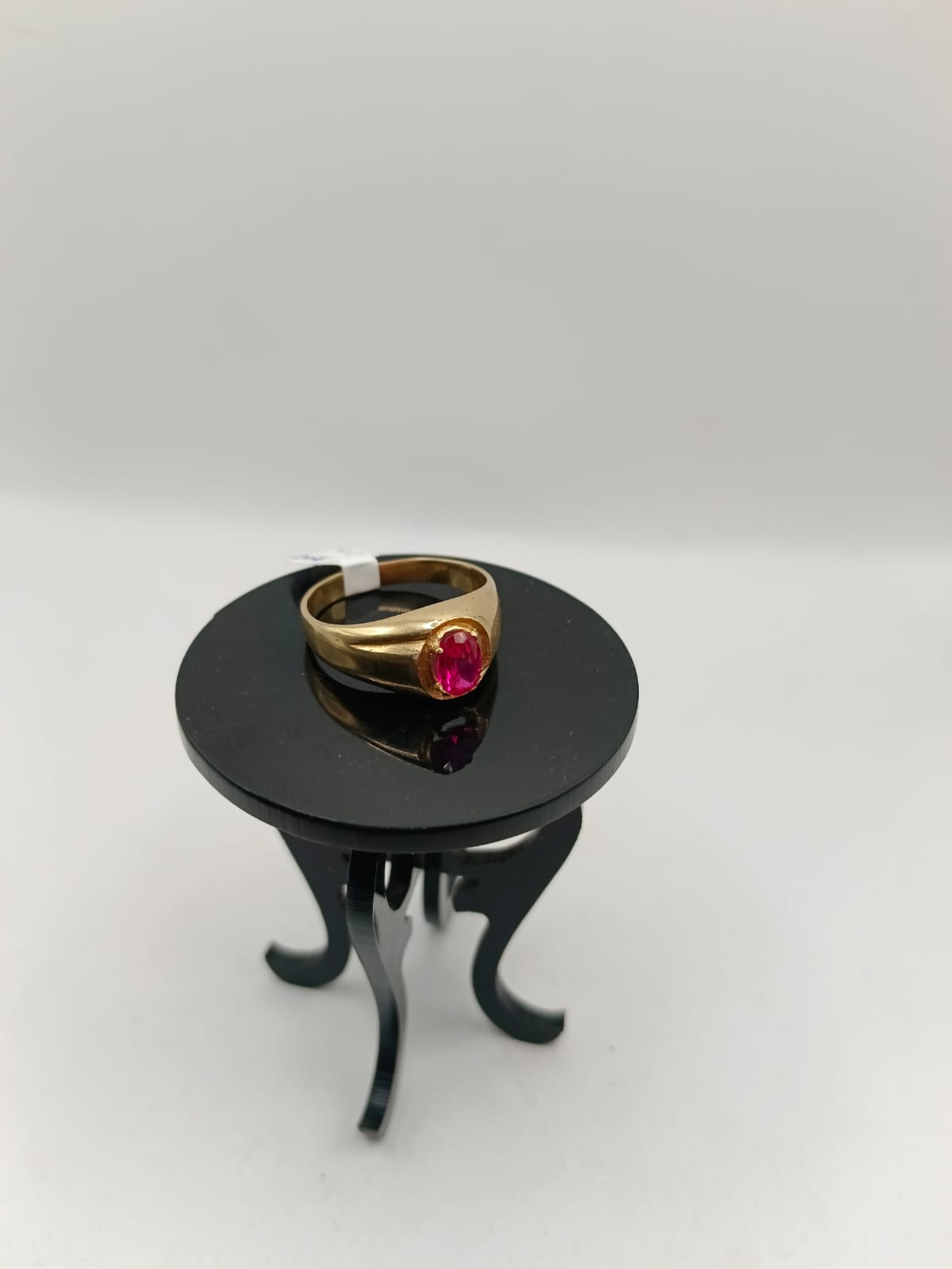 Anillo caballero sintetico rojo 10k peso 4.2gr, usado