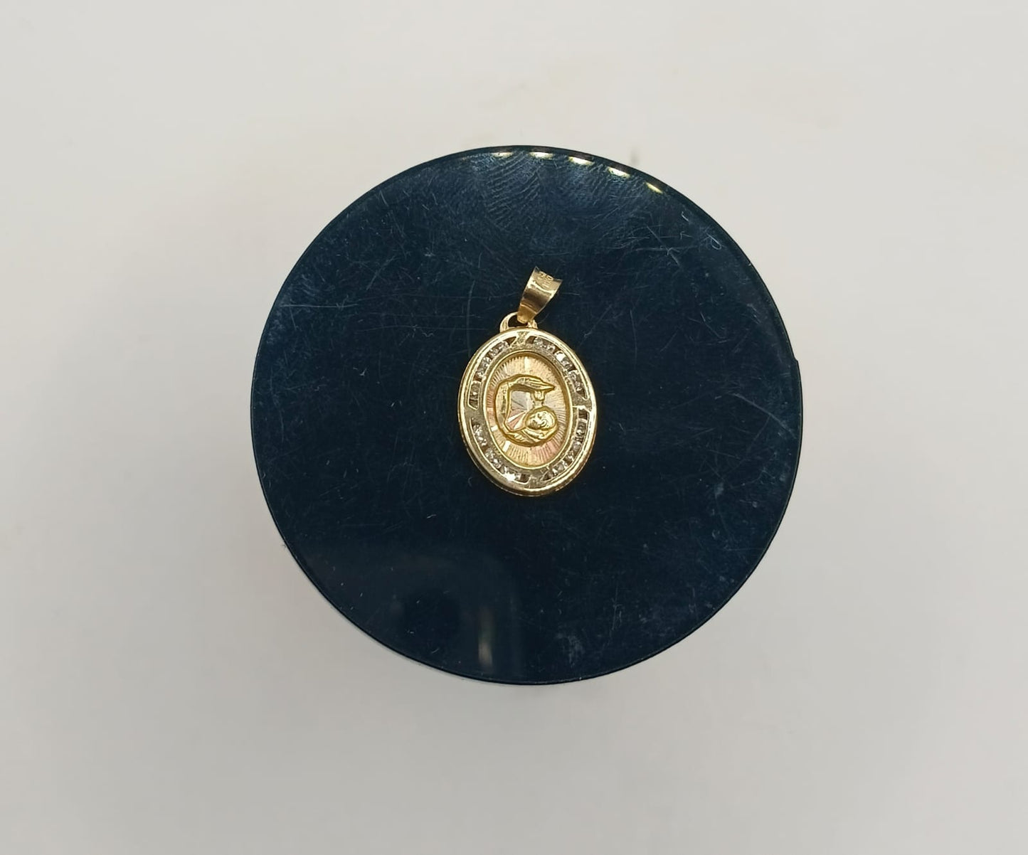 Dije de ORO 10k peso .9gr, usado