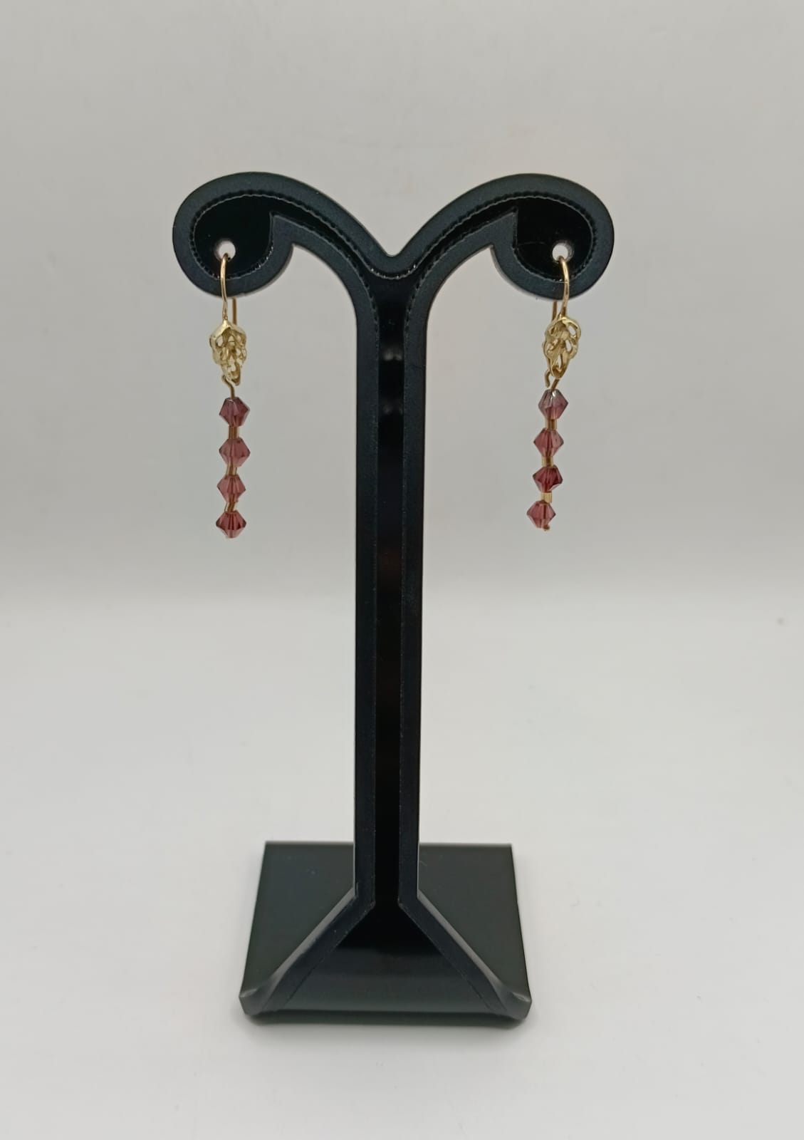 Aretes sintetico cafe ORO 10k peso 2gr, usado
