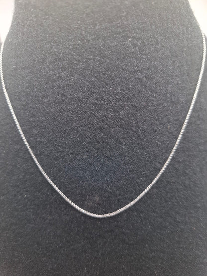 Cadena eslabon corrido ORO BLANCO 14k peso 1.6gr, usado