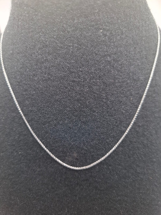 Cadena eslabon corrido ORO BLANCO 14k peso 1.6gr, usado