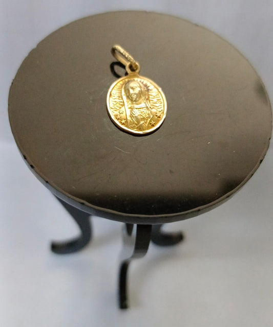 Dije virgen de guadalupe ORO 10 k peso 1gr, usado