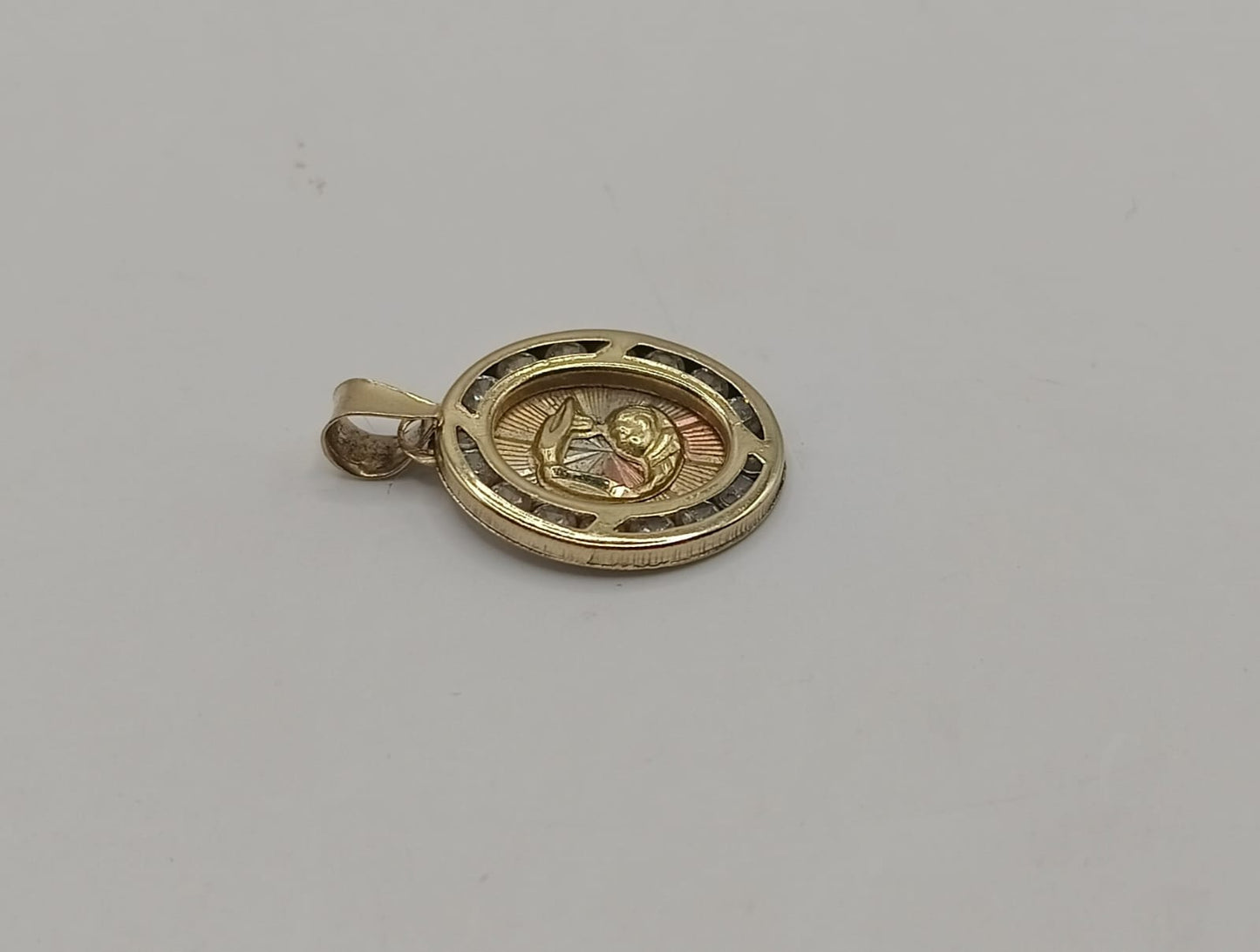 Dije de ORO 10k peso .9gr, usado