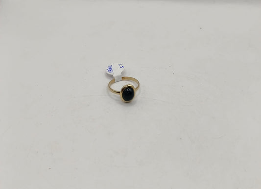 Anillo sintetico negro ORO 10k peso 1.5gr, usado