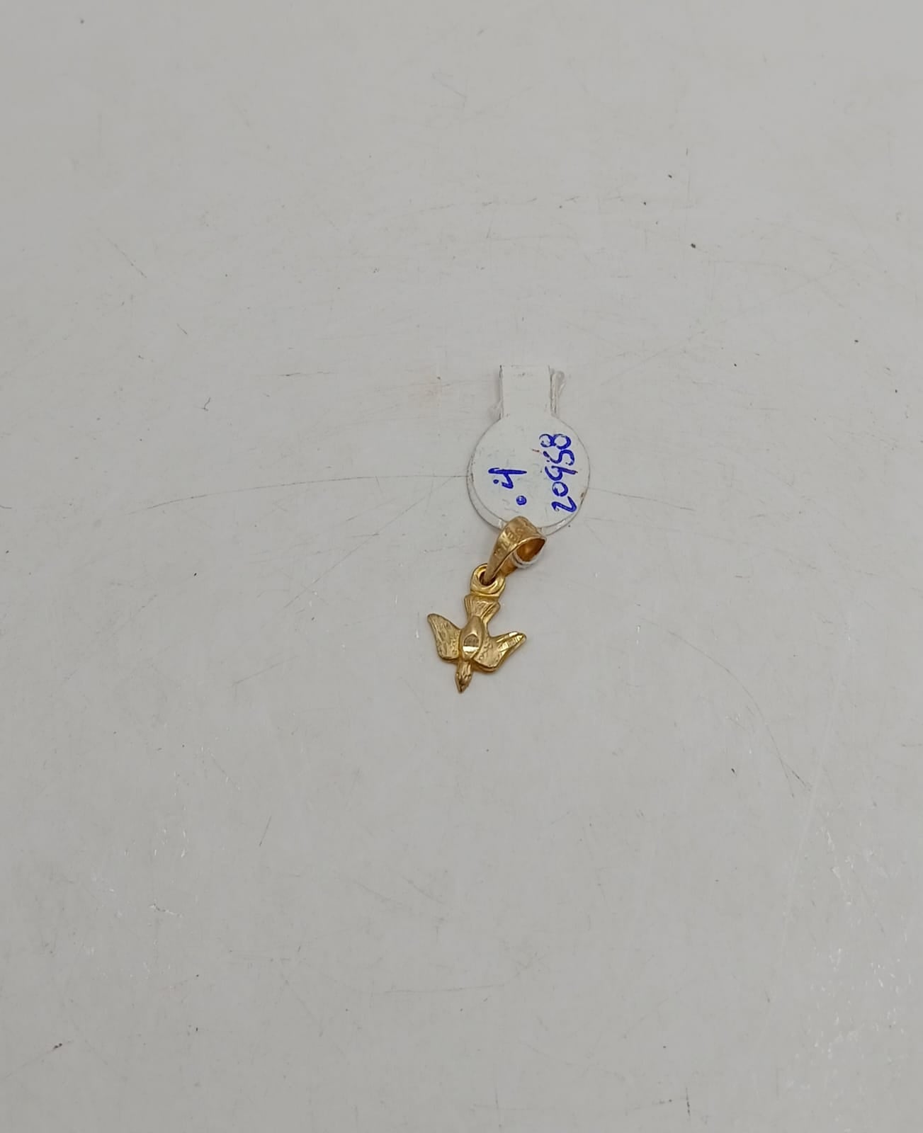 Dije de paloma ORO 10k .4gr, usado