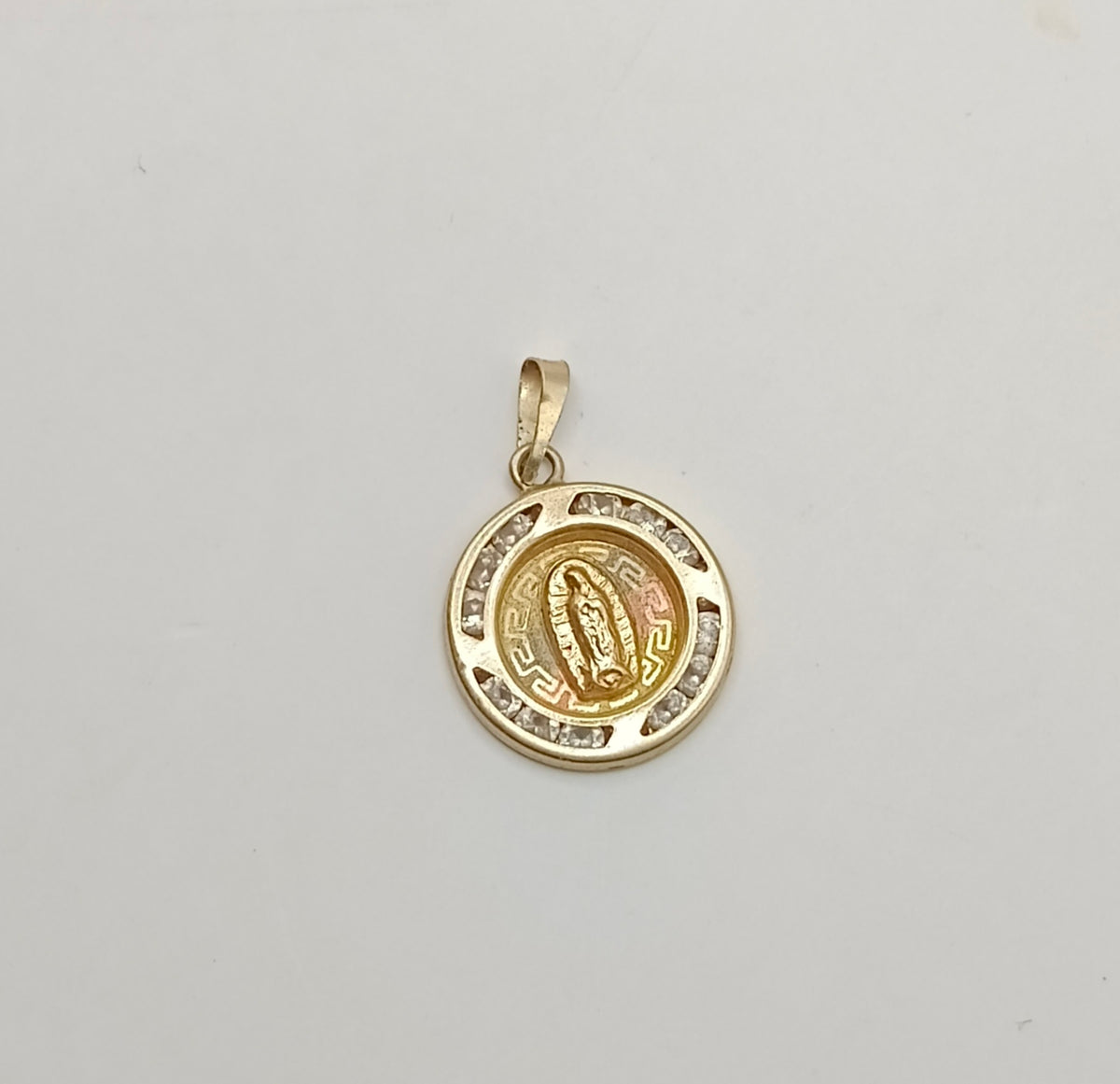 Dije religioso ORO 10k peso .6gr
