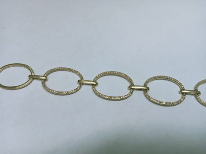 Pulsera de Oro 10k – Aros Entrelazados con Chispitas