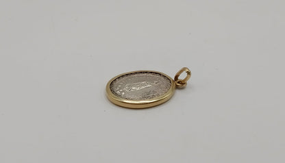 dije religioso ORO .5gr y PLATA 9.4gr, usado