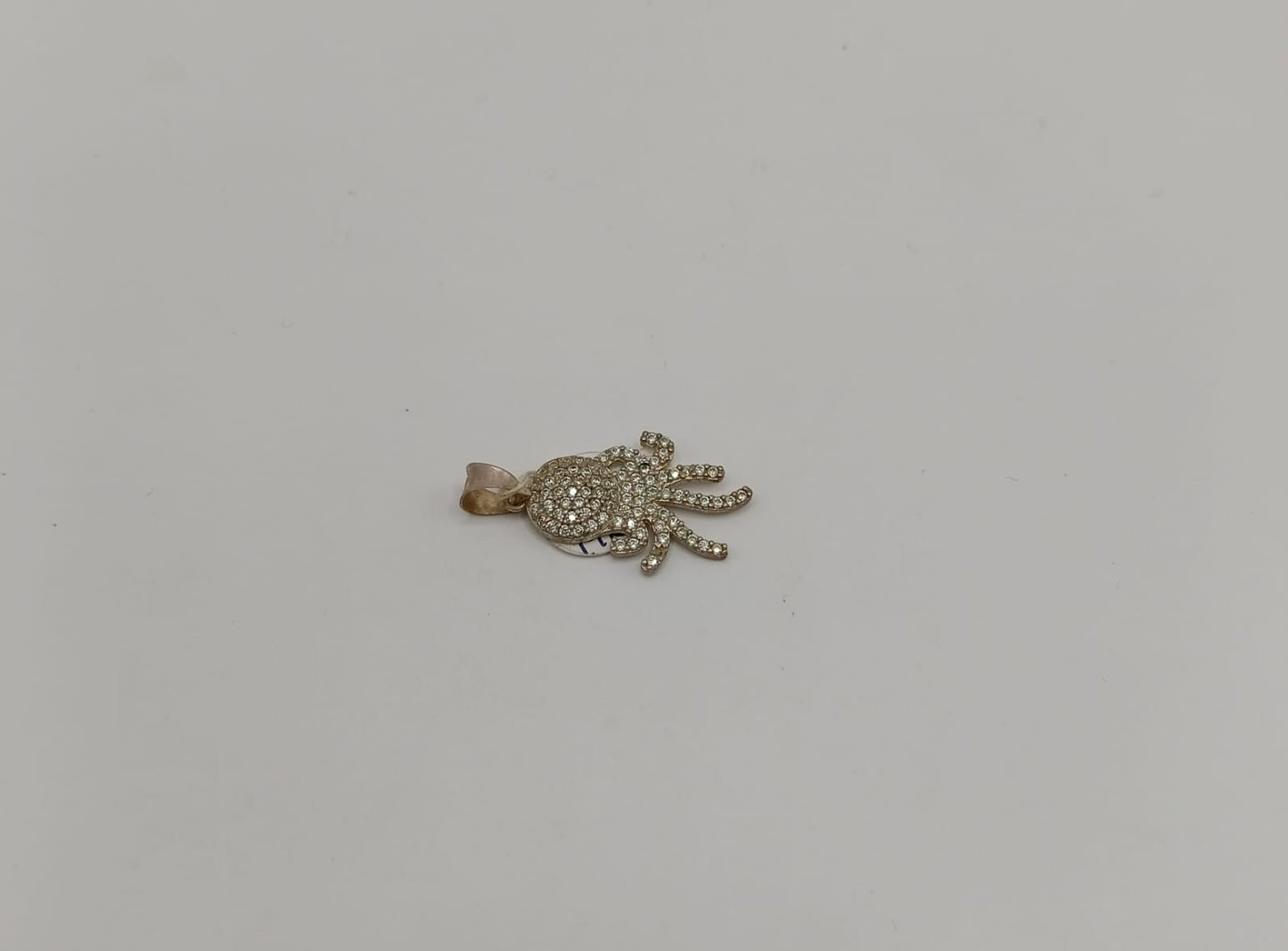 Dije de pulpo PLATA 925 peso 1.9gr, usado