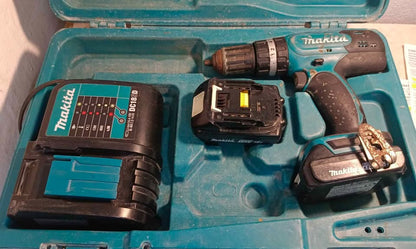Taladro inalámbrico Makita dhp453 con cargador y baterias, usado