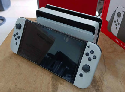Nintendo switch oled con accesorios en caja, usado
