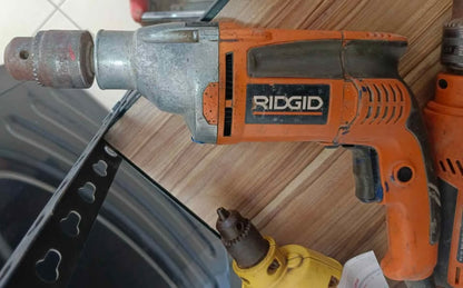 Taladro rotomartillo Ridgid, usado