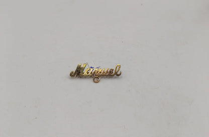 Dije de nombre "MANUEL" ORO 10k peso 1.6gr, usado