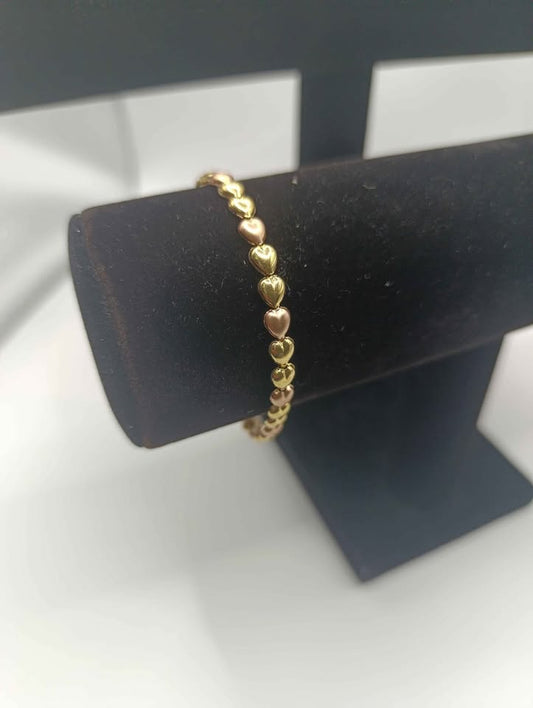 Pulcera corazones de oro 10k 3.8 gr 9cm. Abrochada