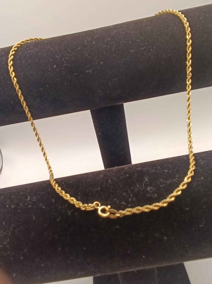 Cadena tejido torzal de oro 14k pesa 6.7g 25.5 cm abrochada