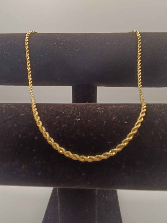 Cadena tejido torzal de oro 14k pesa 6.7g 25.5 cm abrochada