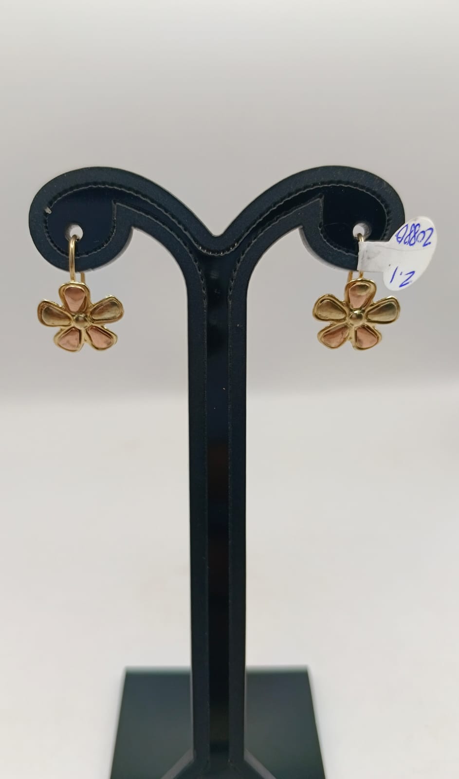 Par aretes flor ORO 10k peso 2.1gr, usado