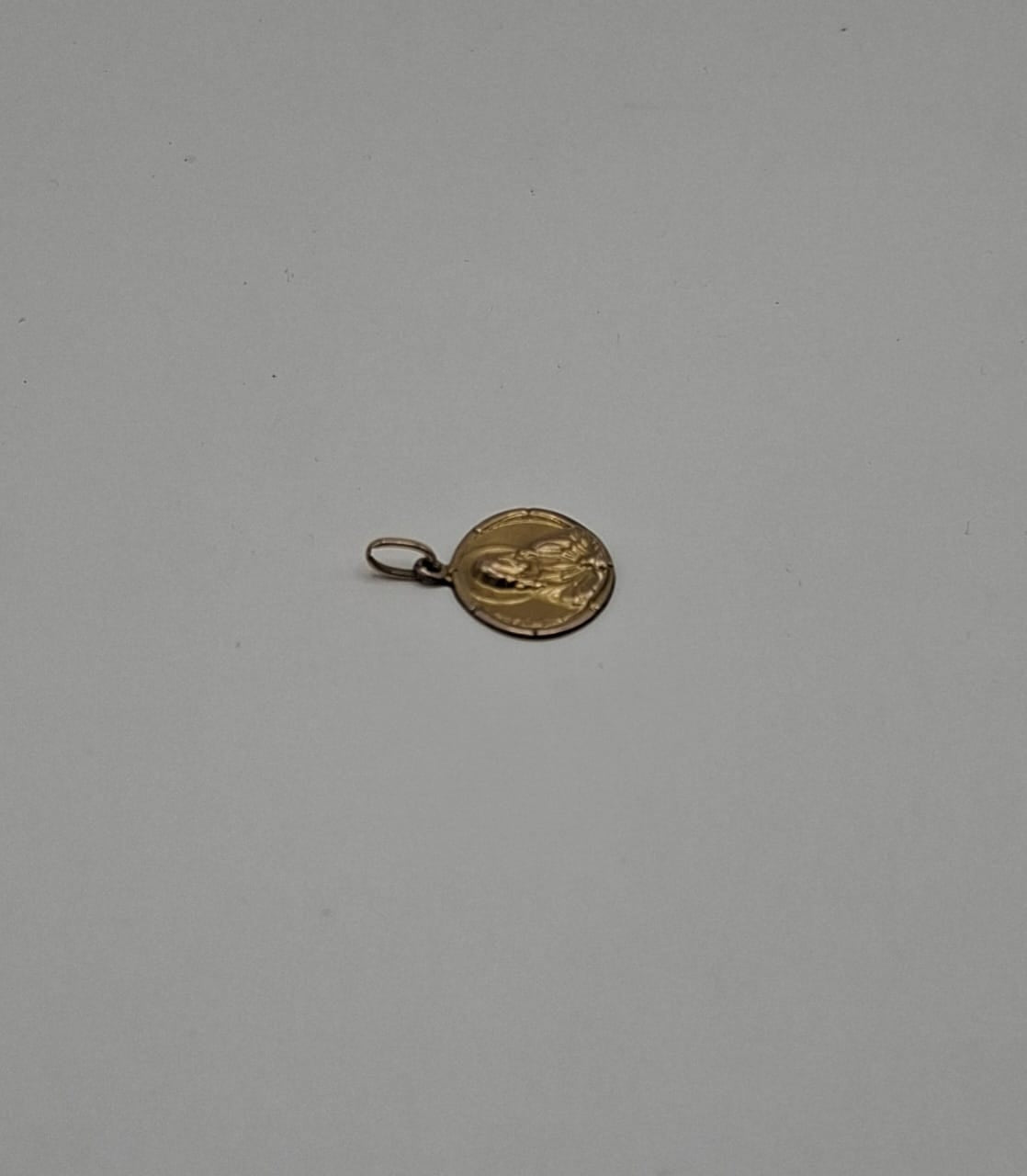 Dije sagrado corazon ORO 10k peso 1gr, usado