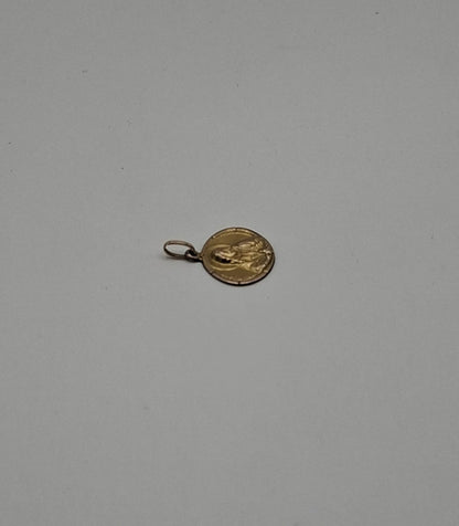 Dije sagrado corazon ORO 10k peso 1gr, usado