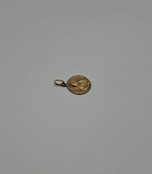 Dije sagrado corazon ORO 10k peso 1gr, usado