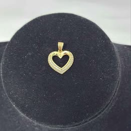 Dije corazón con sintético 10k p 1.3 gr