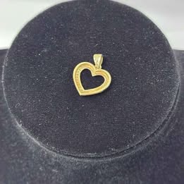 Dije corazón con sintético 10k p 1.3 gr