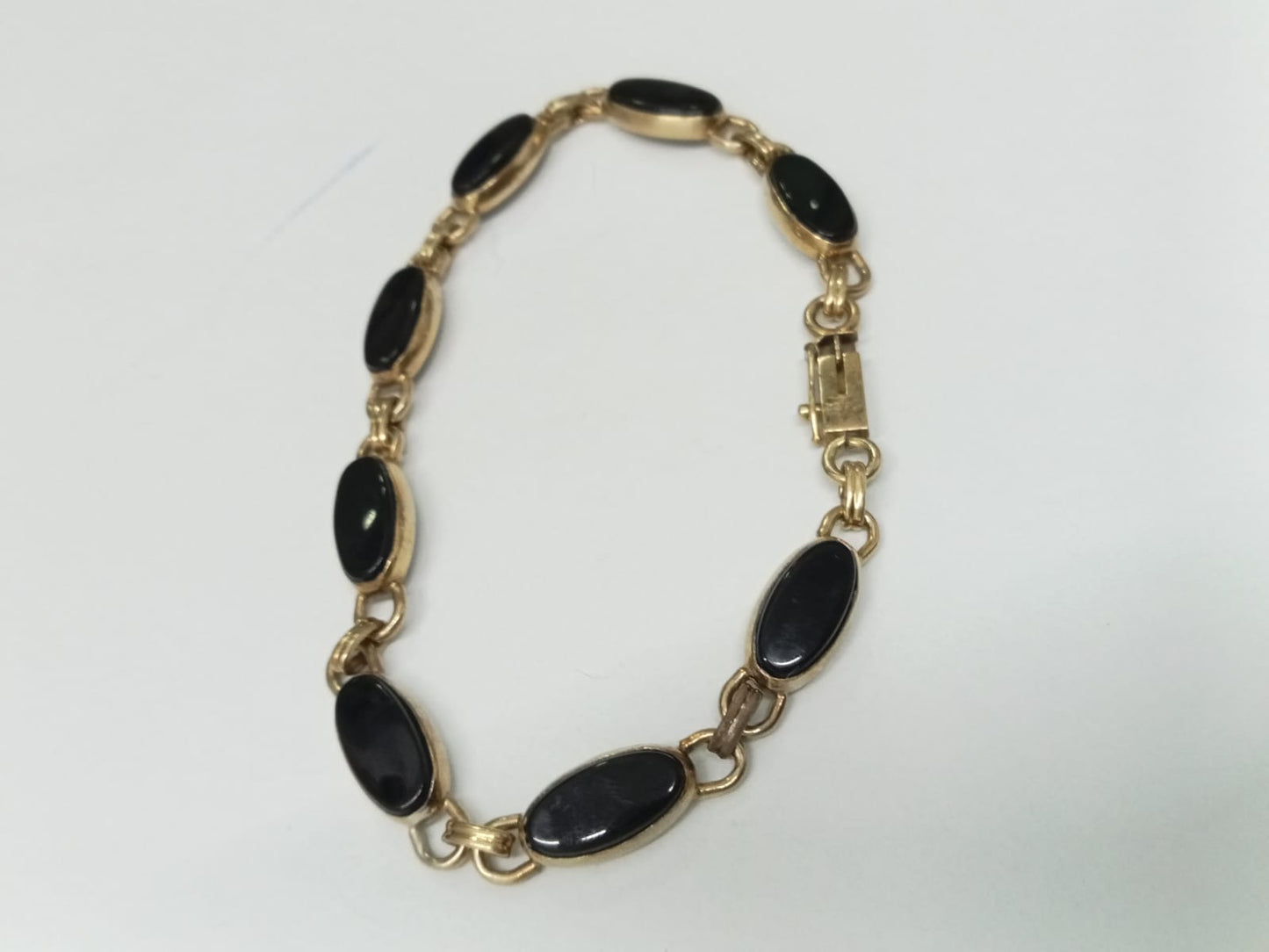 pulsera de oro 10k -diseño sinteticos negros